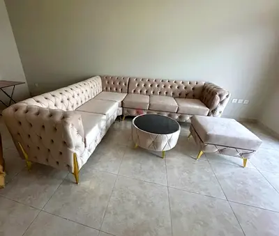 Brand new stylish L shape sofa with table and stool available