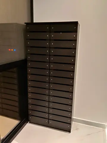 Tall multi-drawer storage cabinet - slim black organizer