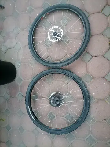 Pair of used mountain bike wheels with tyres and cassette 26er