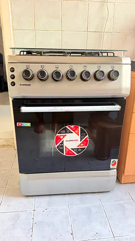 Olsenmark 4-Burner Gas Stove with Oven - Excellent Condition