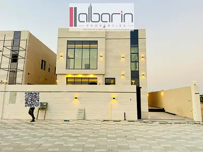 Villa for sale in the Al Zahia area of ​​Ajman, featuring 4 master bedrooms, a spacious majlis, and a living room.
