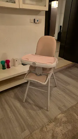 Compact baby high chair - light pink, foldable tray - original purchase price AED 1,049 (FirstCry)