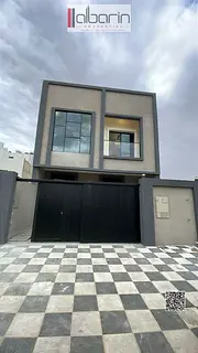 Villa for sale in Ajman: 5-bedroom townhouse (all master bedrooms) with a spacious living area.