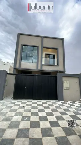 Villa for sale in Ajman: 5-bedroom townhouse (all master bedrooms) with a spacious living area.