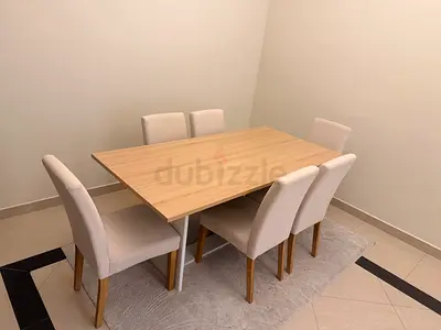 6-Seater Light Wood Dining Table with Upholstered Chairs