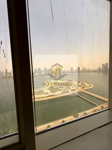 For rent in Al Majaz 3: 3BR, maid & laundry rooms, 5 baths, 2 living areas, free parking, pool & gym. AED 78K, AED 4K deposit, no fees.