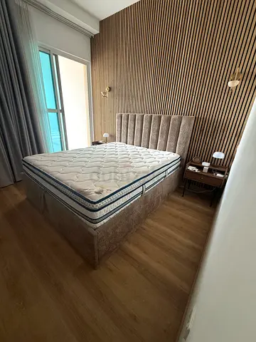 Queen size upholstered bed frame with mattress — good condition