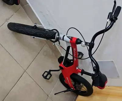 Kids Red Balance/Training Bike with Pedals - Good Condition