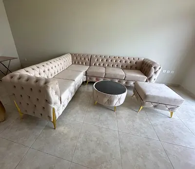 Brand new stylish L shape sofa with table and stool available