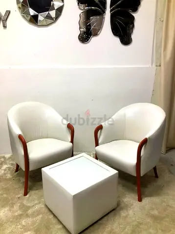 White Leather Armchair’s with coffee table