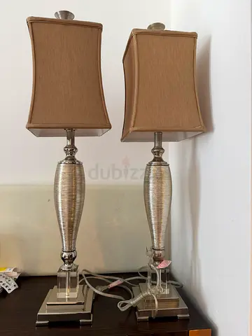 Pair of elegant silver table lamps with beige rectangular shades