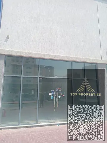 ل تجاري للإيجار – الراشدية، عجمان  ✨ فرصة تجارية مميزة على الشارع العام  🇦🇪 التفاصيل بالعربي  📍 الموقع: الراشدية – عجمان 🔢 رقم المحل: 14 📐 المساح