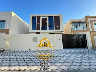 Luxury family villa for sale in Al Zahia - Ajman, modern design and spacious areas including 4 master bedrooms, a majlis and two living rooms, directl