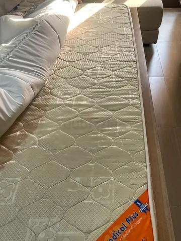 Single mattress in good condition - firm support and medicated