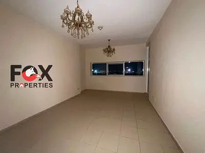 Luxury two-bedroom apartment with living room | Al Rashidiya 3 | Parking | Built-in wardrobes | Central AC | Open view | Gym + swimming pool