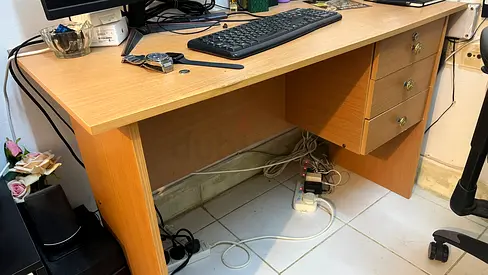 Used wooden computer desk with 3 drawer storage — good condition