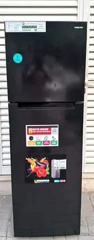 Double door Nikai Refrigerator, color dark gray. Good working condition.