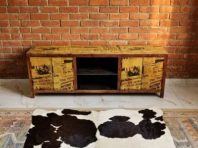 Wooden TV Cabinet with Vintage Newspaper Print and Open Shelves