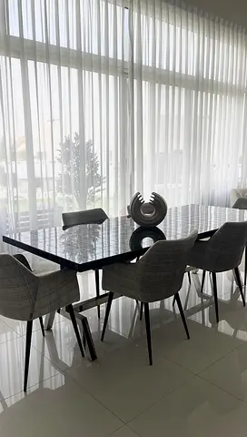 Modern glass dining table with 6 chairs - from Marina home