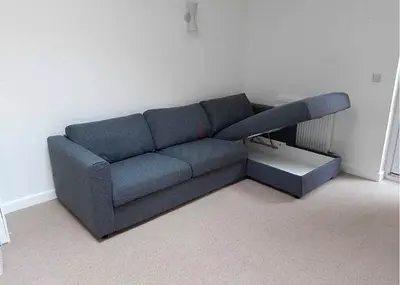 Grey L-Shaped Sofa Bed with Built-in Storage