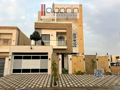Villa for sale in Ajman, Al Helio 2 area: 5 master bedrooms, a separate majlis, and a living room.