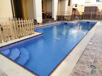 PRIVATE ENTRANCE - COVERED PARKING -SHARED POOL