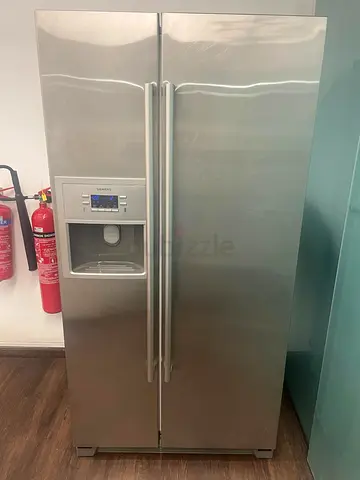 Siemens Side-by-Side Stainless Steel Fridge with Water Dispenser - Good Condition