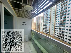 For annual rent: Two bedrooms, living room, balcony, and three bathrooms in Pearl Towers, Rashidiya 