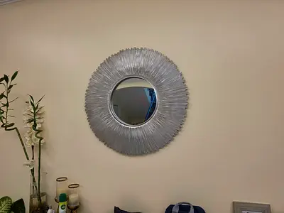 Round Silver Sunburst Wall Mirror - Decorative Accent