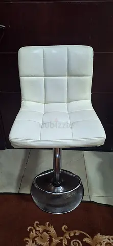 Danube Home White faux leather swivel bar stool with chrome base