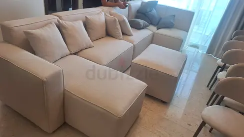 Looks Like a new U Shape Sofa With footstools