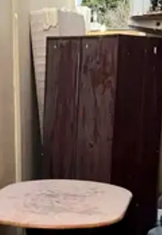 Used wooden wardrobe bed and table - good for storage or DIY