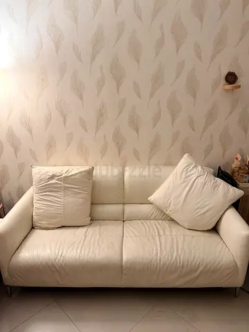 Cream leather 3-seater sofa in good condition