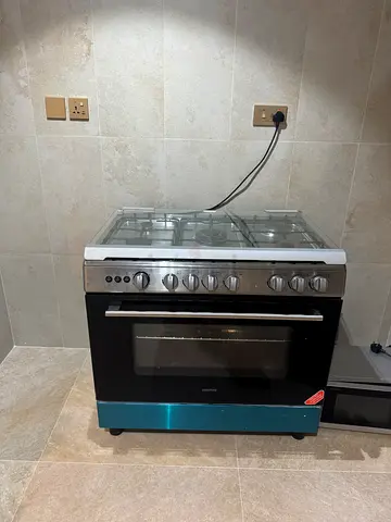 Used freestanding gas oven and stove - stainless steel, good condition