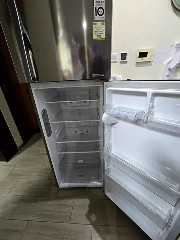stainless steel fridge - spacious interior, good condition