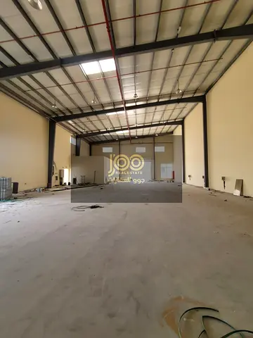 New warehouse on a main road, 32,000 sq. ft., with 200 kW electricity and 6 worker accommodation rooms.