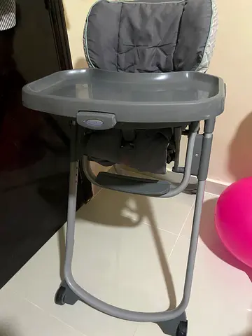 Used baby high chair with tray - good condition
