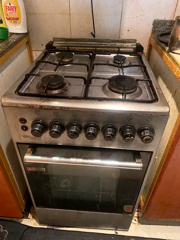 Used freestanding gas stove with oven - 4 burners, stainless steel
