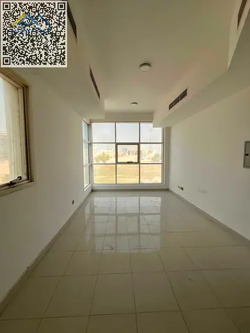 Spacious studio available for annual rent in Al Liwara, Ajman, featuring a separate kitchen, central air conditioning, and a prime location