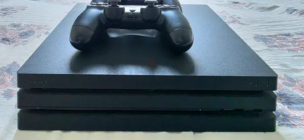 Sony PS4 Pro (Slim Stack) with 2 DualShock 4 - Good Working Condition.