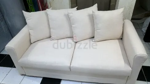 Beige 2-seater Sofa bed in Good Condition Ikea grolind