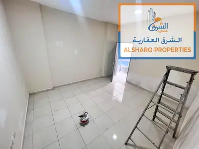 Two bedrooms, a living room, two bathrooms, a large kitchen, and a balcony with a distinctive view;