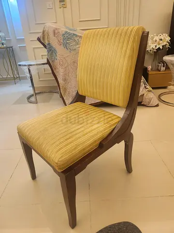 Pair of mid-century style dining chairs with mustard upholstery