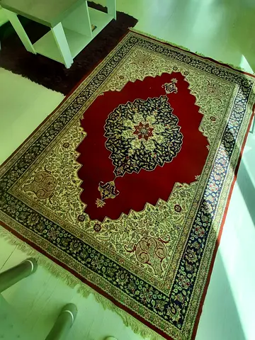 Classic red Persian-style area rug, good condition