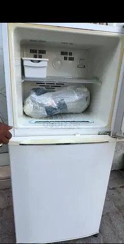 Used Two-Door Refrigerator with Freezer - Good Working Condition