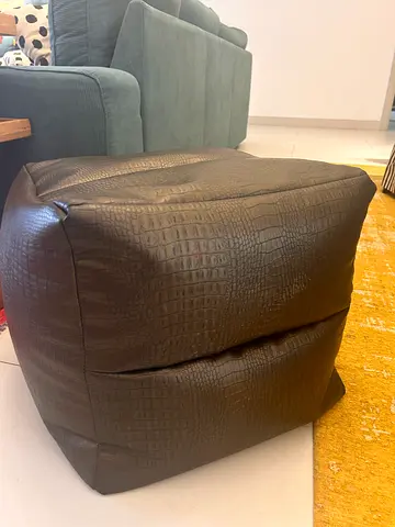 Cube pouf/ottoman in dark brown crocodile-embossed. The One