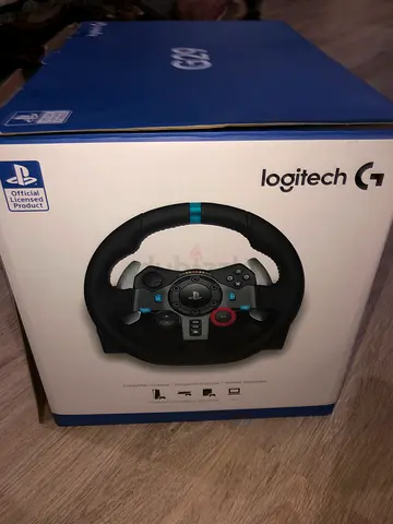Logitech g29 steering wheel and paddles and 2cds, crew 2, gran turismo 7