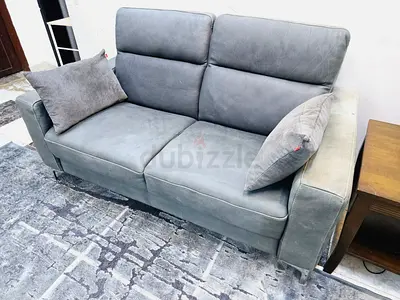 2-seater grey leatherette sofa in good condition