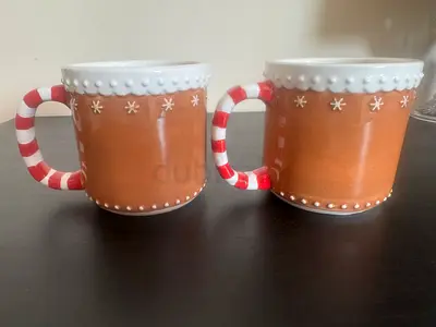 Set of 2 holiday ceramic mugs — brown with striped handles Christmas mugs