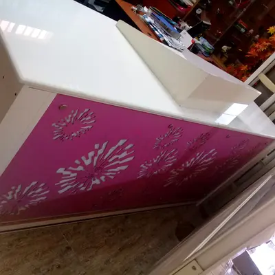 White Reception Counter / Front Desk with Pink Decorative Panels